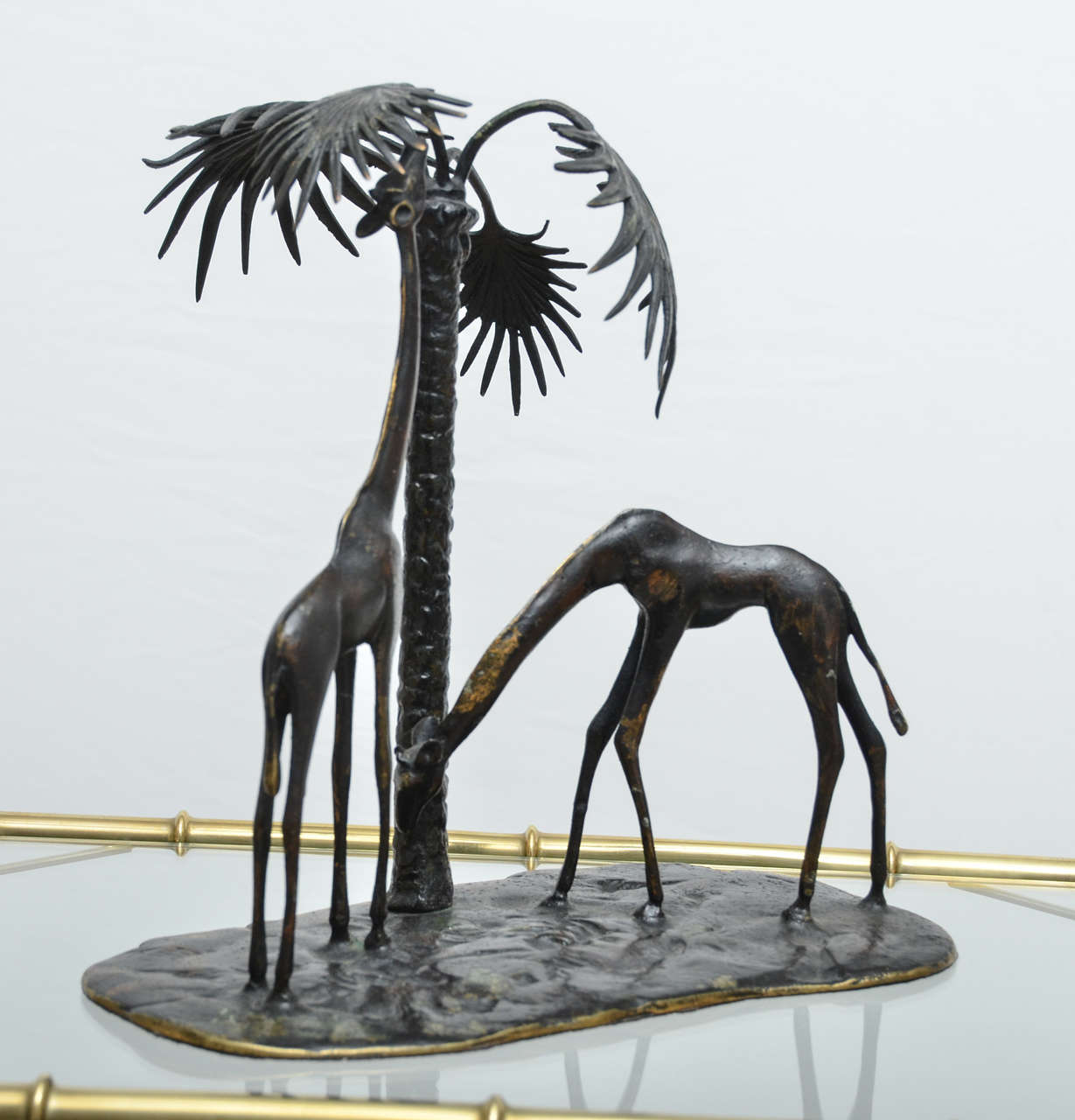 Sculpted bronze giraffe vignette.