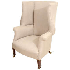 Upholstered Stylized Wing Chair