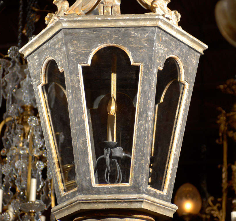 Painted and giltwood six-sided lantern. Three lights.