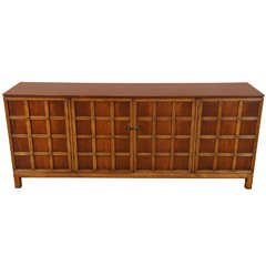 A Walnut Credenza with Lattice Front