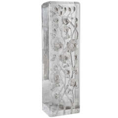 A Lucite Sculpture with Carved Flowers