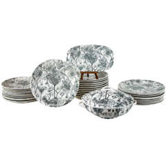 A Set of Plates and Assorted Serving Pieces by Gien