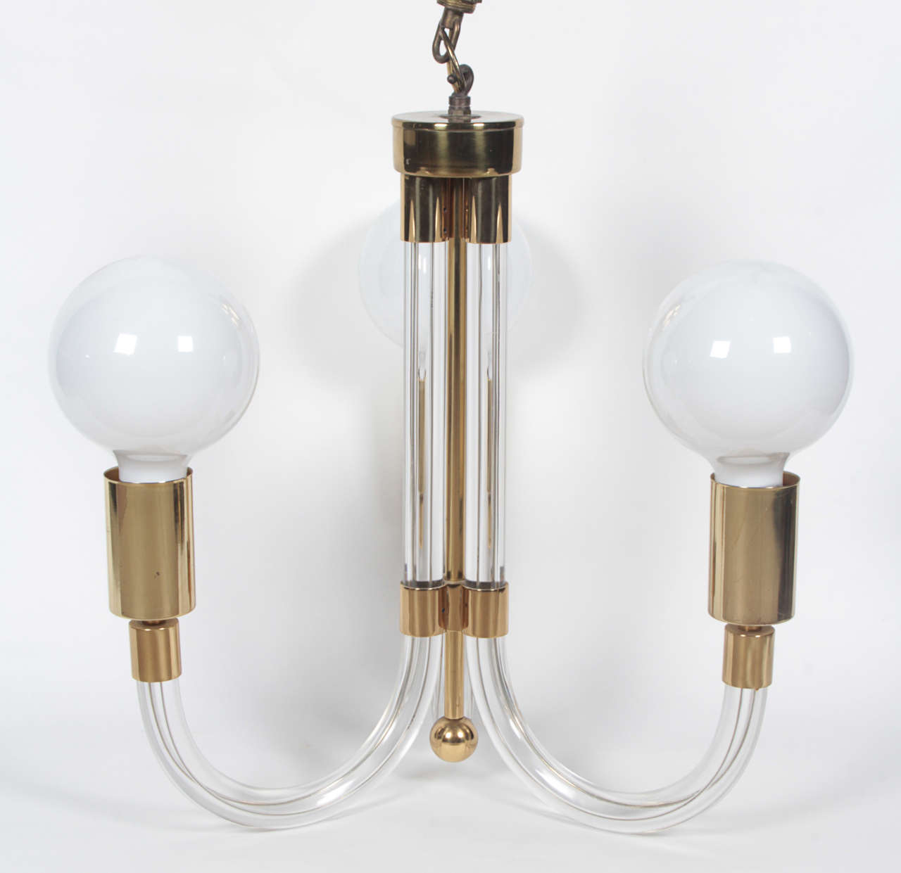 Dramatic Lucite & brass chandelier with three arms by Peter Hamburger.  USA, circa 1970. 

Rewired for U.S.; takes three standard-base bulbs, 75 watts max.  May be used with either a globe-style bulb (as shown) or custom clip-on shade.  Globe