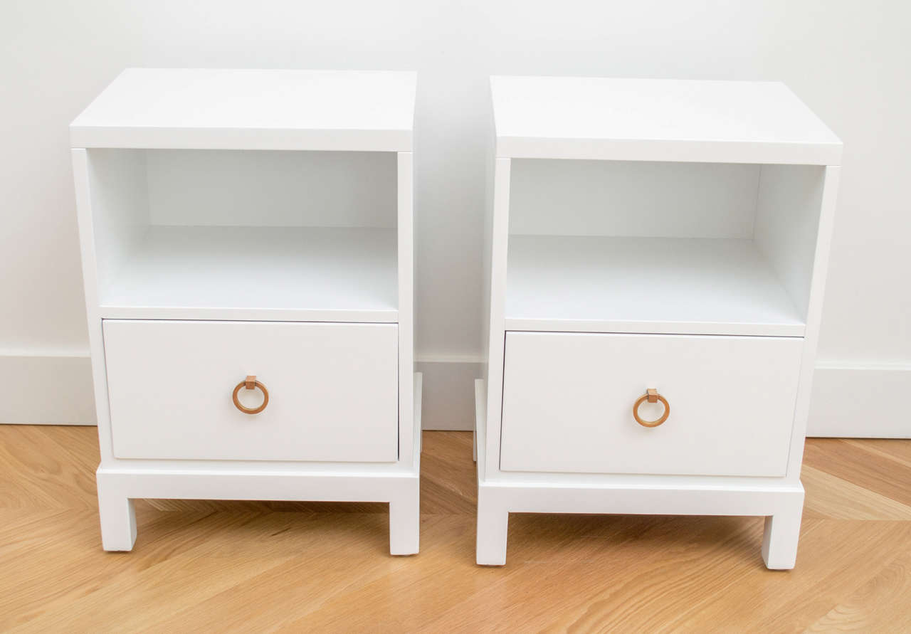 Pair of white lacquered Widdicomb nightstands with brass hardware.

This piece is part of the Widdicomb Modern Originals Flexi-Unit series (initially known as the Horizontal Vertical Sectional Modern series), a series that was made by Widdicomb but