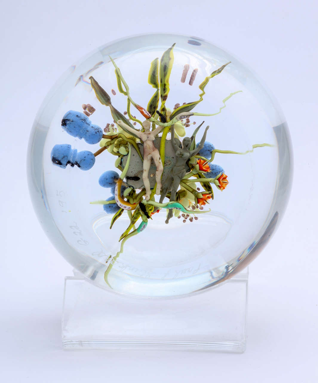A beautiful Paul Stankard bouquet paperweight with a central honeycomb, yellow chicory, blueberries, honey bee and two spirits