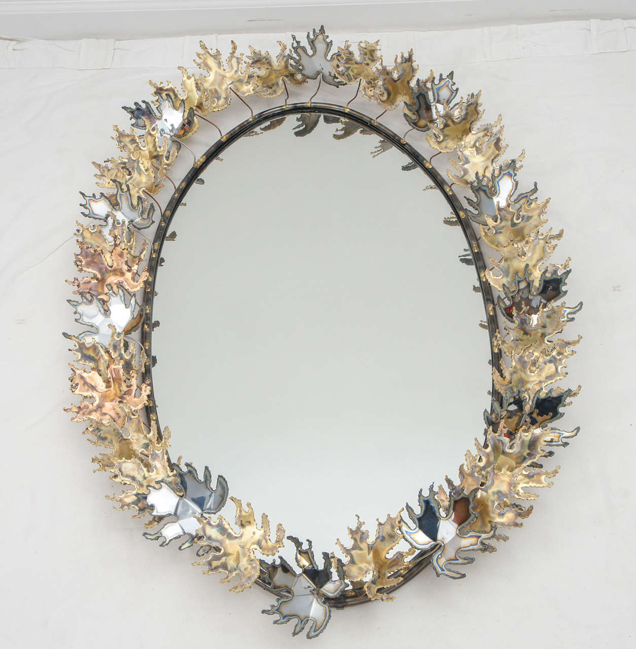 a pair of Curtis Jere Autom Leaf mirrors