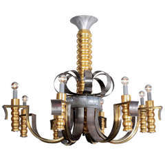 Palatial and important brass and steel French chandelier -Charles Dudouyt