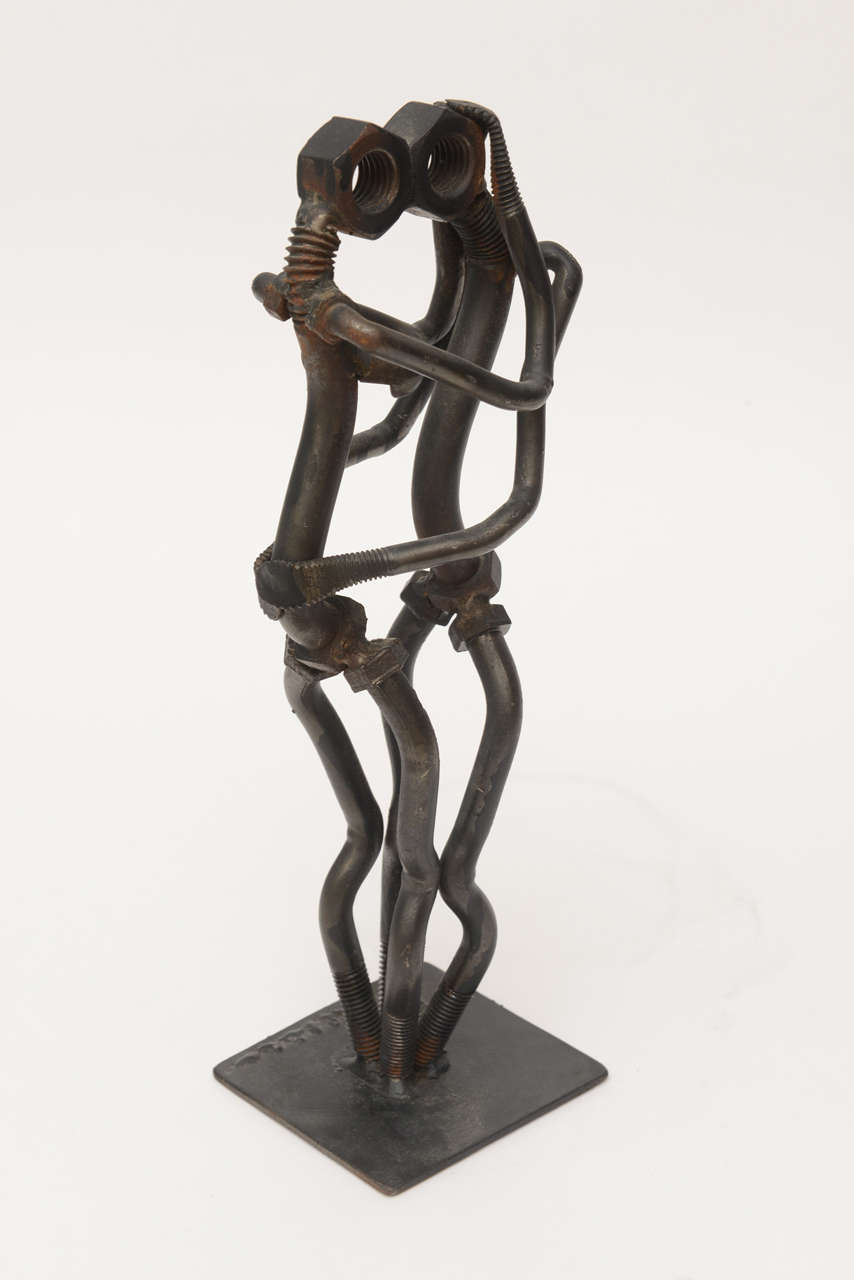 "The Nuts and Bolts of Two Lovers Embrace, " Signed Iron Sculpture at