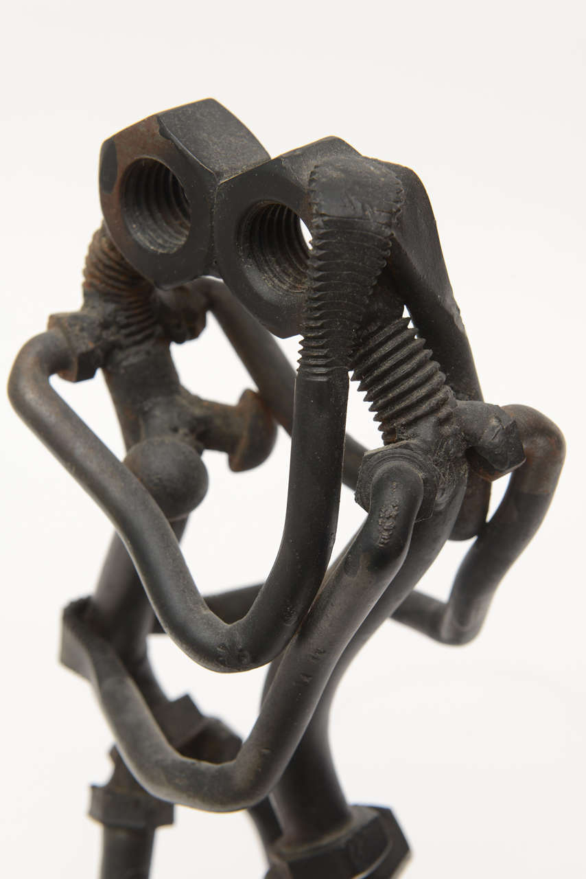 "The Nuts and Bolts of Two Lovers Embrace, " Signed Iron Sculpture at