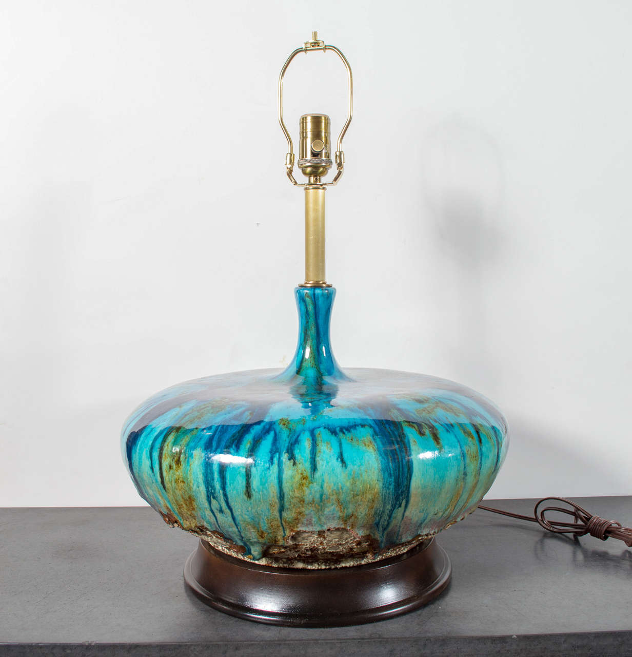 Fabulously shaped fat lava glazed lamp with drip overglaze. Recently rewired and in lovely condition.