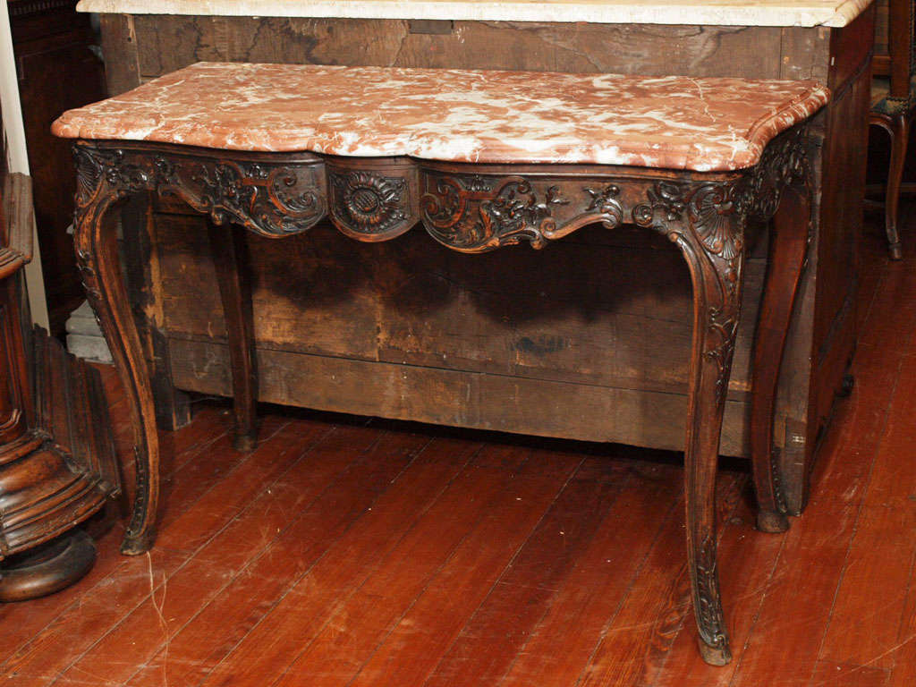 18TH CENTURY Walnut Provencal console with sunflower motif and marble top