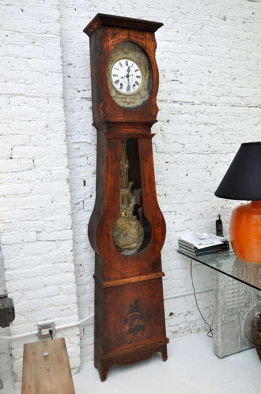 Beautiful antique Morbier grandfather clock with painting to look like inlaid wood. Sold AS IS, clock's working condition is unknown. Clock has not been serviced.