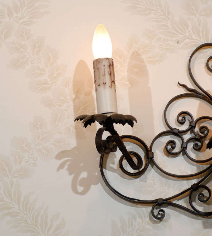 French Pair of Vintage Black Iron Wall Sconces from France, Circa 1920 For Sale