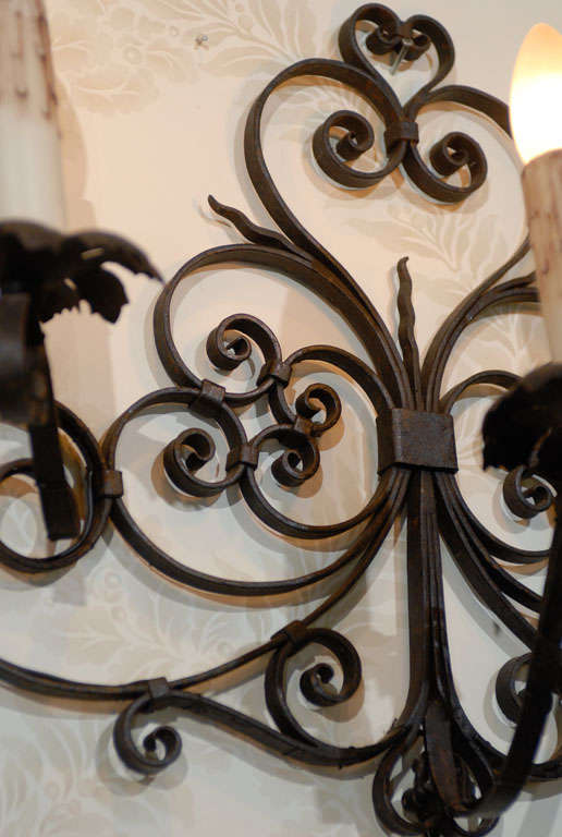 20th Century Pair of Vintage Black Iron Wall Sconces from France, Circa 1920 For Sale