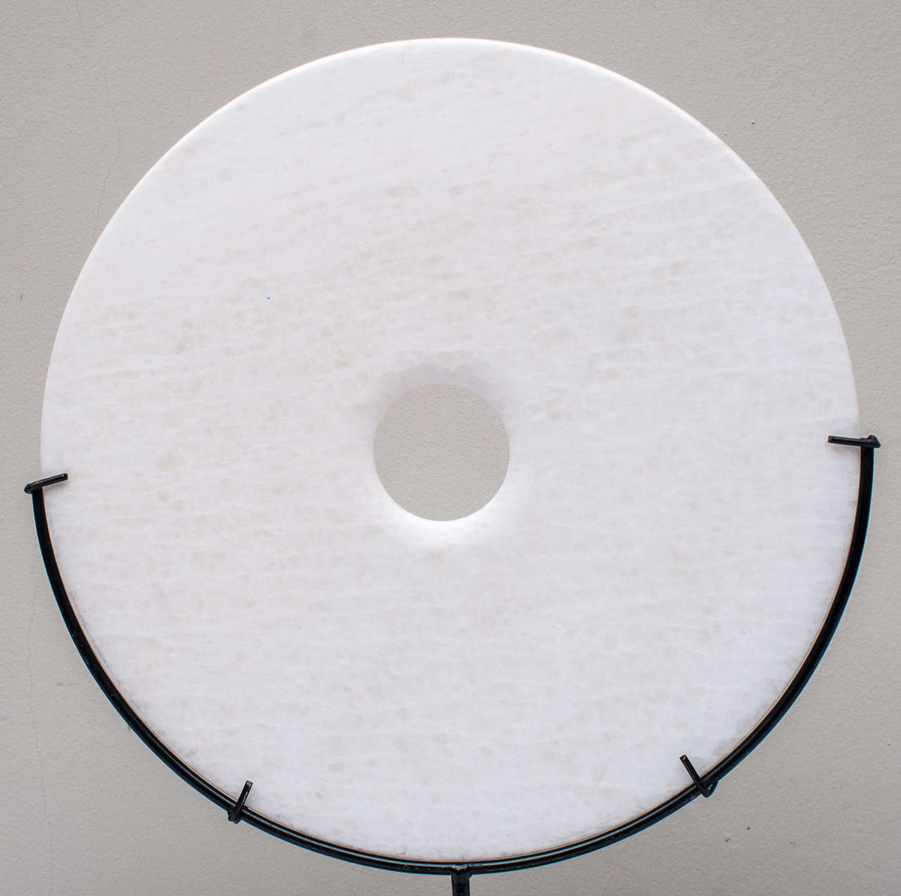 marble disc on stand