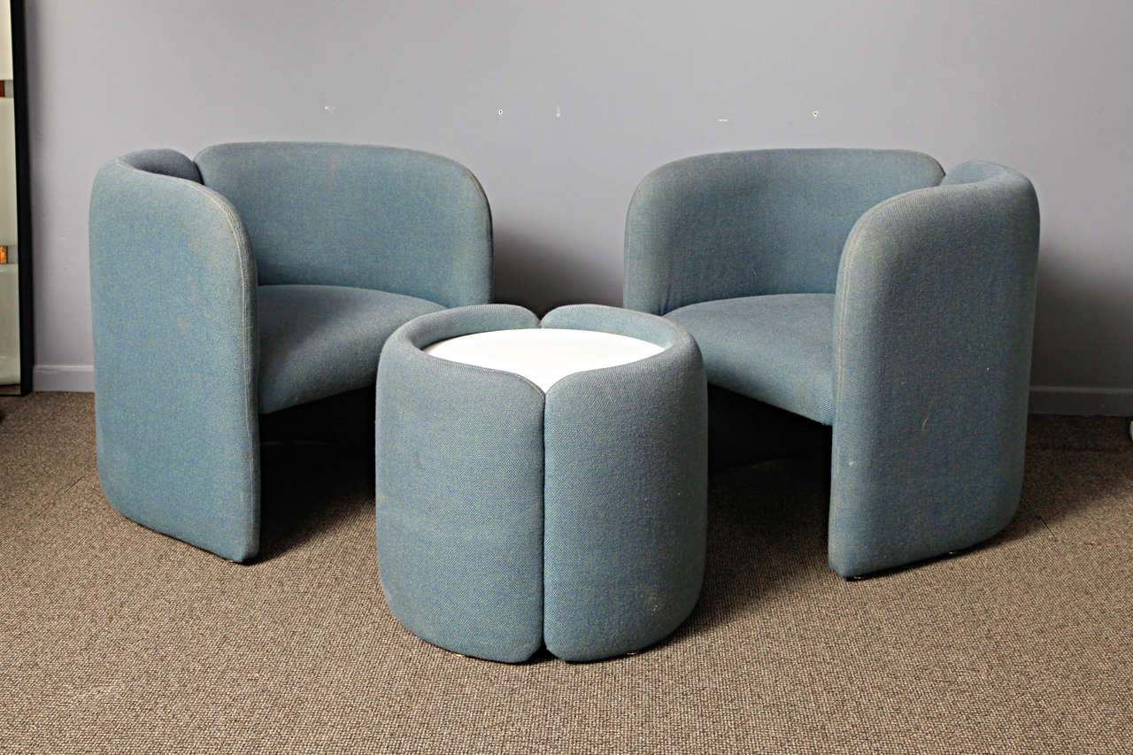 A set of  two armchairs and a sidetable edited in the 60's
 by Bulo ,the belgian office furniture maker .
Light blue-grey upholstery in authentic perfect condition.
Shipping dimensions: 2x 67cmx60cmx70cm
                                   1x