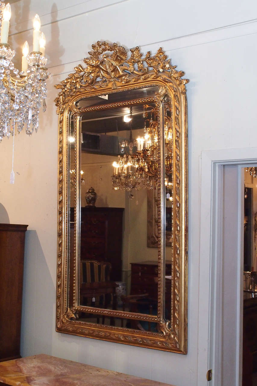Gold Leaf Antique French gold leaf cushion mirror with 