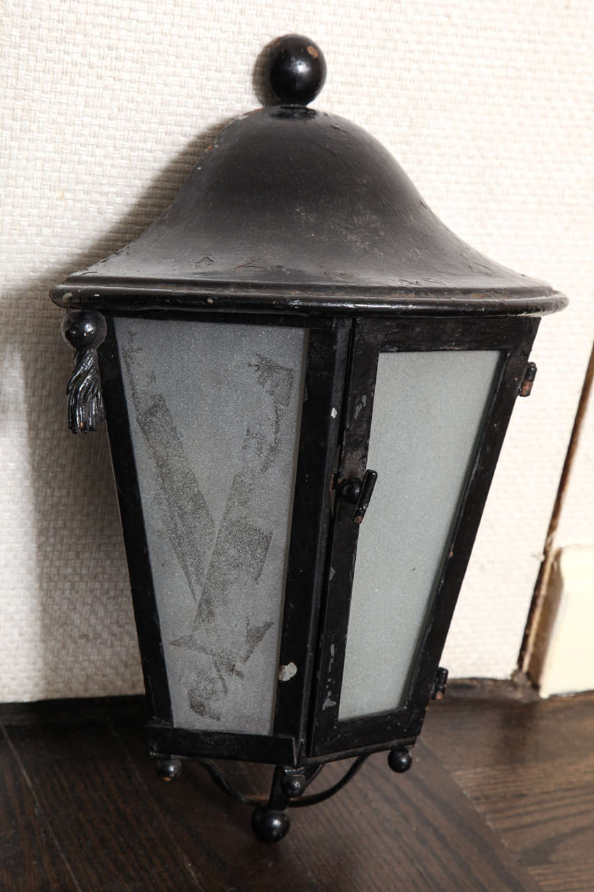 A Pair of French Wrought Iron Lanterns
Mid 20th Century
Sold in As Is condition (need wiring)