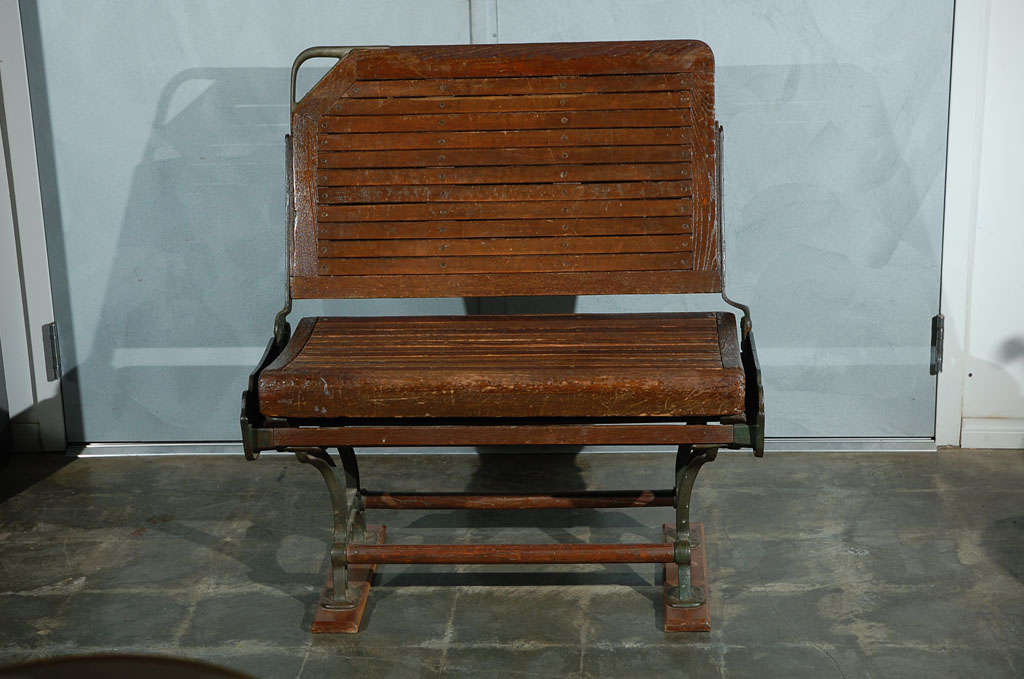 A great American bench. Patented by the Heywood Brothers in Wakefield Mass. Feb. 14. '89, it is sure to have seen its share of trains, buses, cars, etc come and go. This has to be a rare item and will be an interesting piece of Americana in any