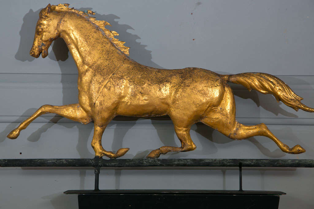 A very fine gilt Ethan Allen Full-Bodied Running Horse weathervane.
Provenance: from a 40 year collection of weathervanes 
featured in 