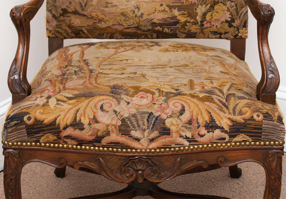 Faithful copy of a French Baroque chair - light color to wood - strong and comfortable - tapestry is probably older than the chair.