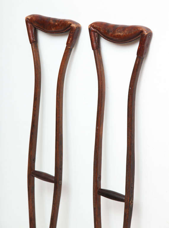 This is an incredibly beautiful pair of Civil War era rosewood and leather crutches. I've used them myself having recently had both feet operated on and I can attest to their comfort. And the chic factor is quite high! A brilliant alternative to