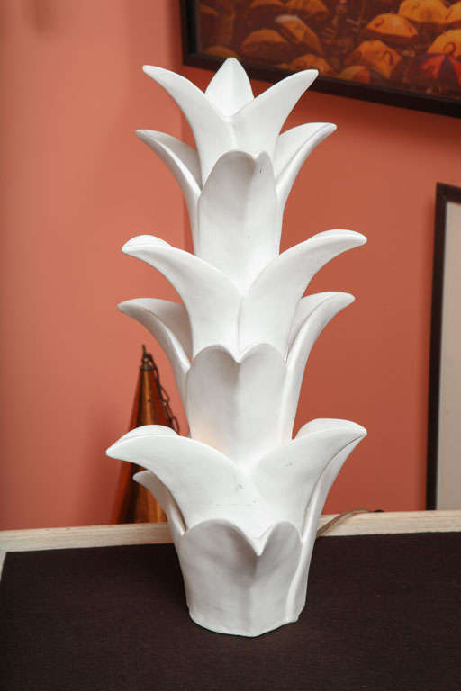A gorgeous French plaster palm torchere with a wonderful organic sensibility.

*We ship internationally* 