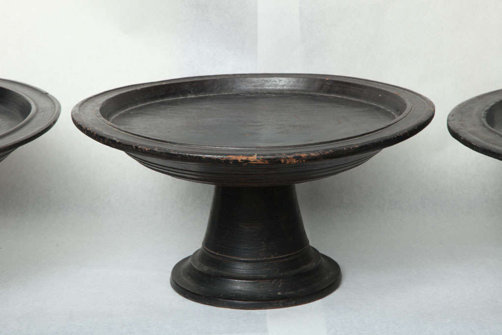 A selection of painted wood serving platters on pedestal stands from the Island of Lombok (Dulang Lombok.) Three sizes, priced and sold separately. Largest size priced below.