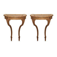 Pair of Italian Carved and Gilt Wood Consoles
