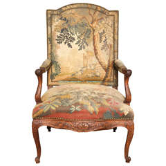 A French Louis XV Style Tapestry Covered Armchair