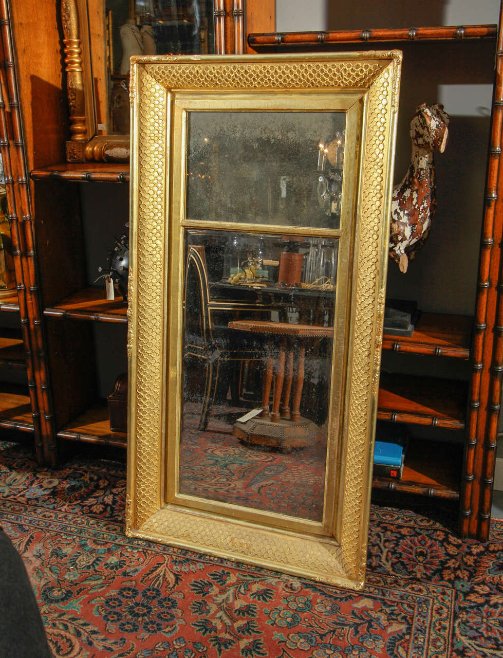 Large gilt on wood frame mirror.