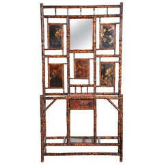A Bamboo Hall Tree with Chinoiserie Panels and Inset Leather Top and Drawer