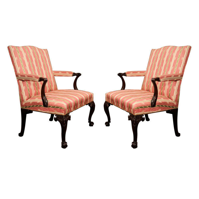 An Assembled Pair Of George III Mahogany Library Armchairs For Sale