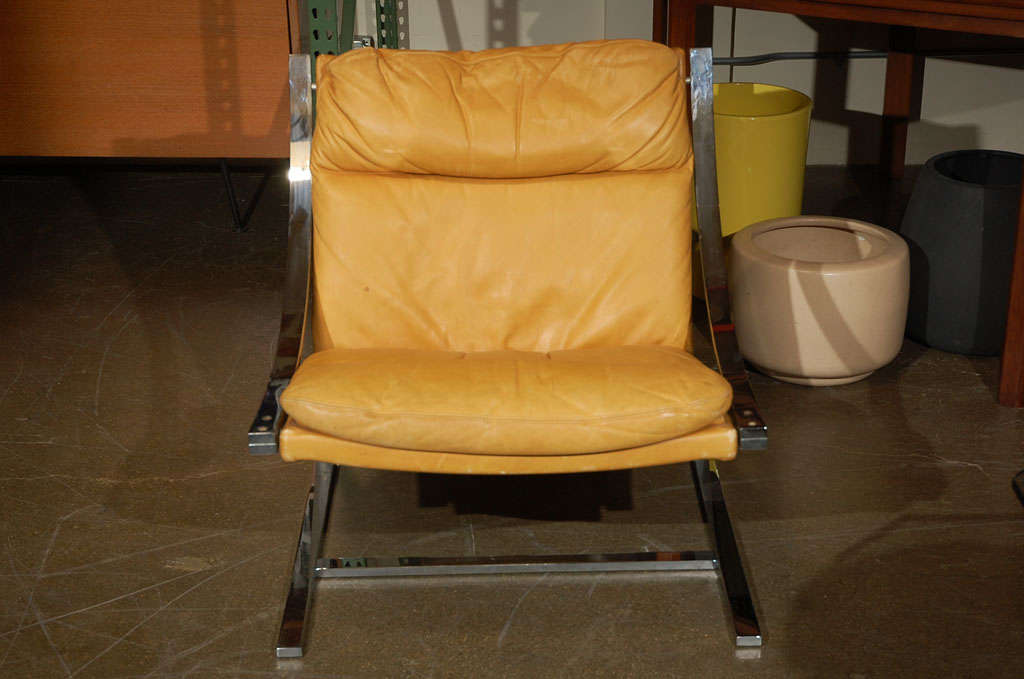 Leather upholstered lounge chair with chromed steel frame by furniture designer Paul Tuttle for Strassle, Switzerland. Called the 