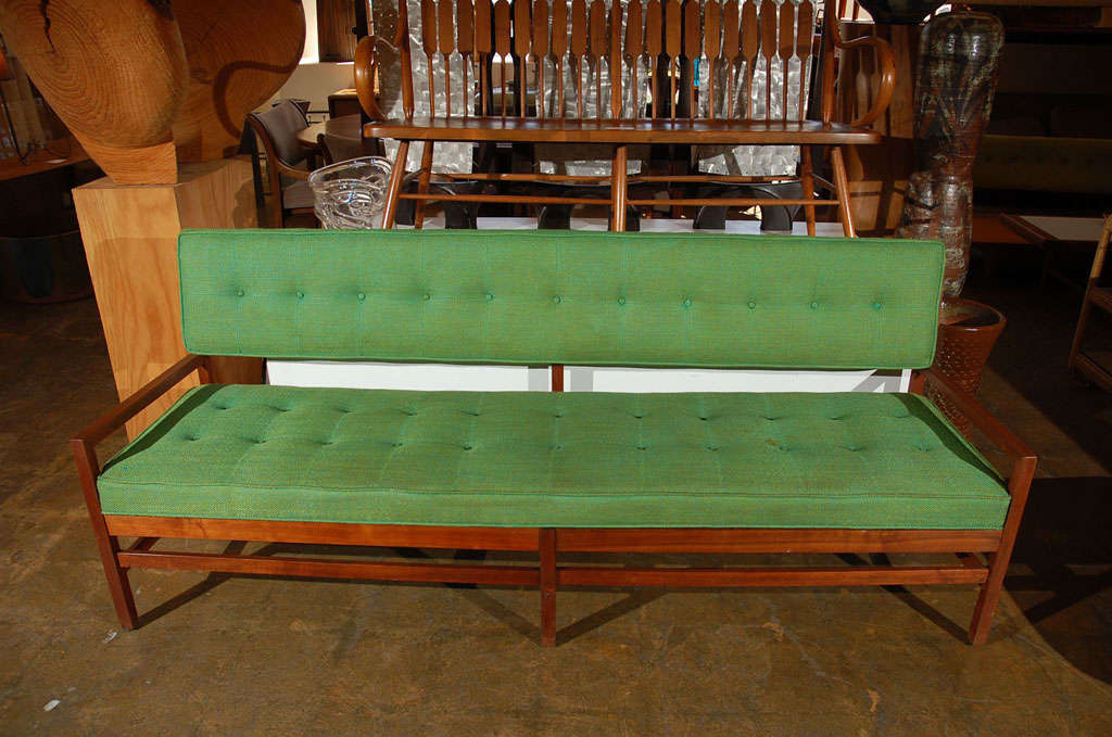 Walnut bench style sofa with  tufted upholstered seat and back