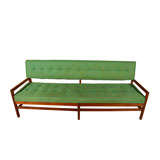 Walnut bench style sofa with  tufted upholstered seat and back