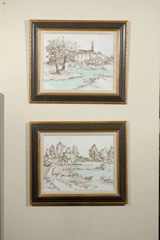 This is a set of four sepia and aqua blue landscapes.  Each landscape is lovely and inviting.  The paintings are by Dora McDaniels.  The frames are hand carved and painted by Fred Reed Picture Framing, Inc.  The frames have gold details which add to
