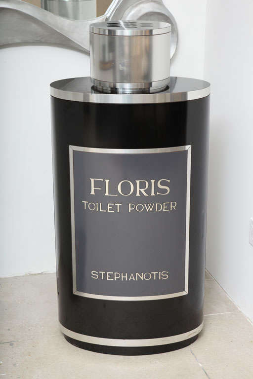 Floris shop display of a Stephanotis talcum powder bottle. Floris London purveyors of the finest perfumes and toiletries the the court of saint James since year 1730