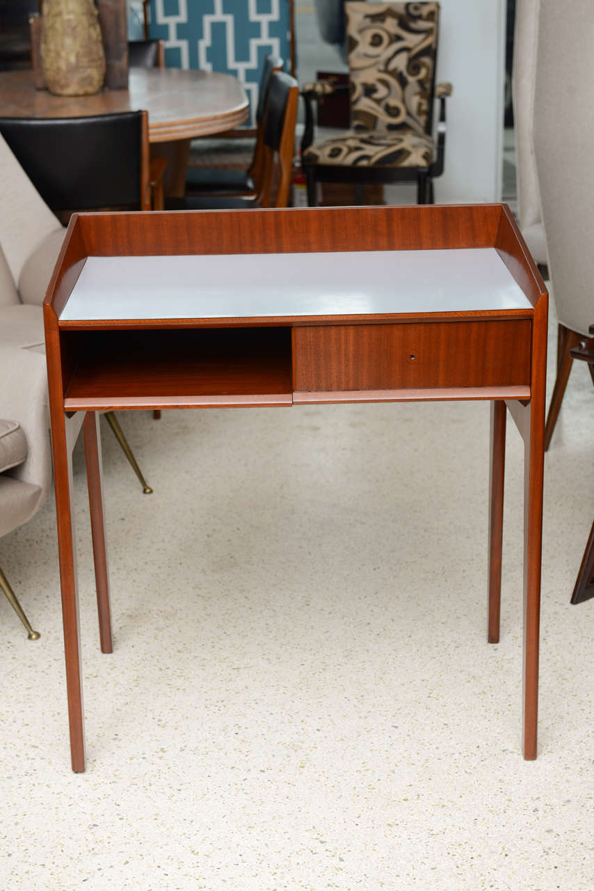 With one drawer and a cubby, the formica original in slate blue.
Provenance: Parco Di Principe Hotel, Italy.