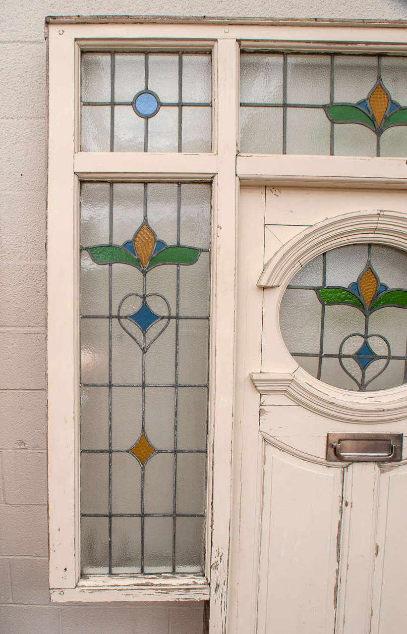 front door with stained glass side panels
