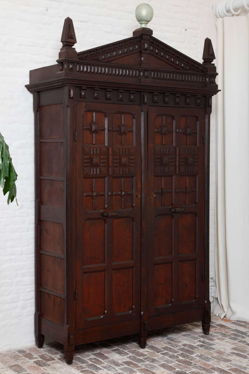 A French Napoleon III 1890's oak geometric cabinet