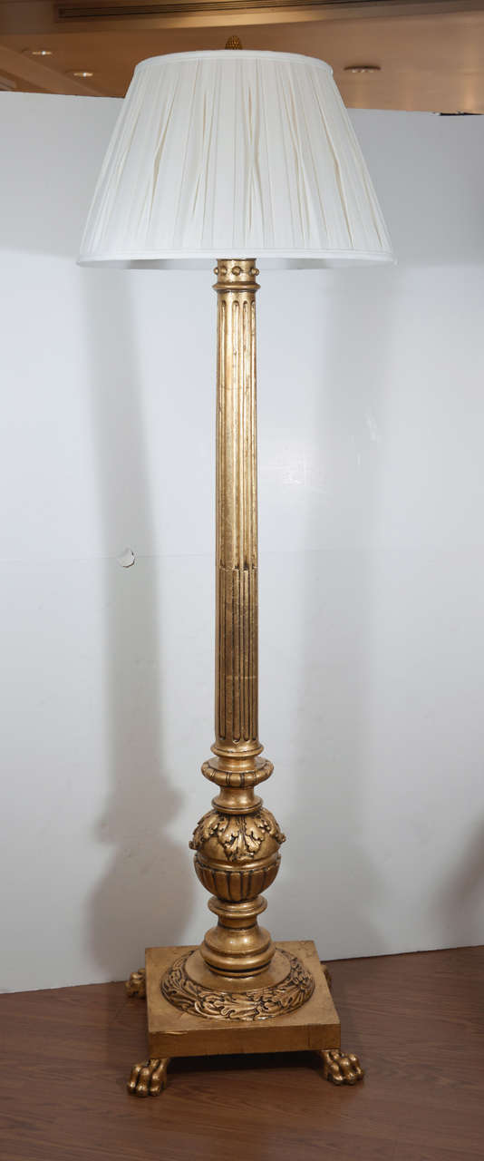 19th c French Empire gilded floor lamp. Hand carved with paw feet .