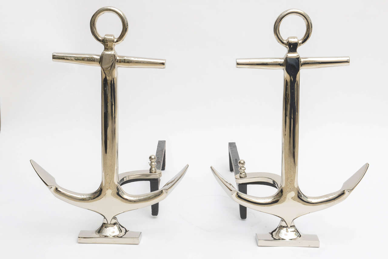 Pair of nickle-plated anchor-form Mid-Century andirons by Puritan.

Note: This set was recently professionally nickle-plated.

Please feel free to contact us directly for a shipping quote or any additional information by clicking 