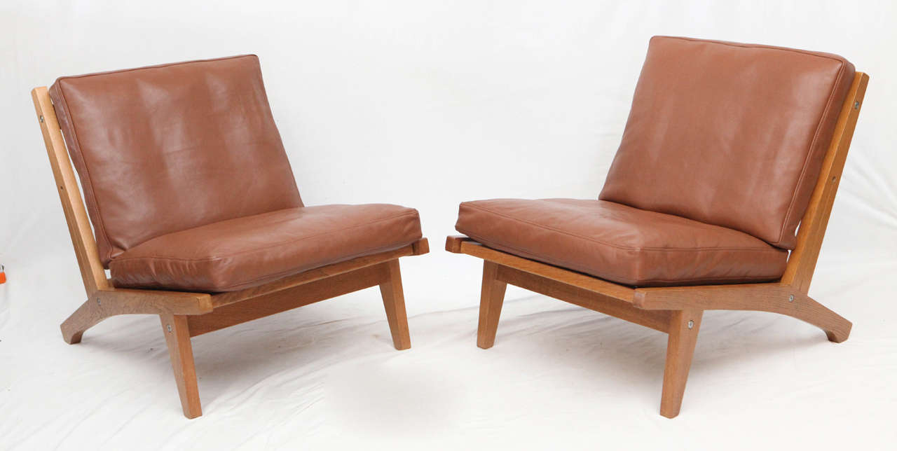 Pair of Hans Wegner GE-375 lounges chairs produced by Getama.   Store formerly known as ARTFUL DODGER INC