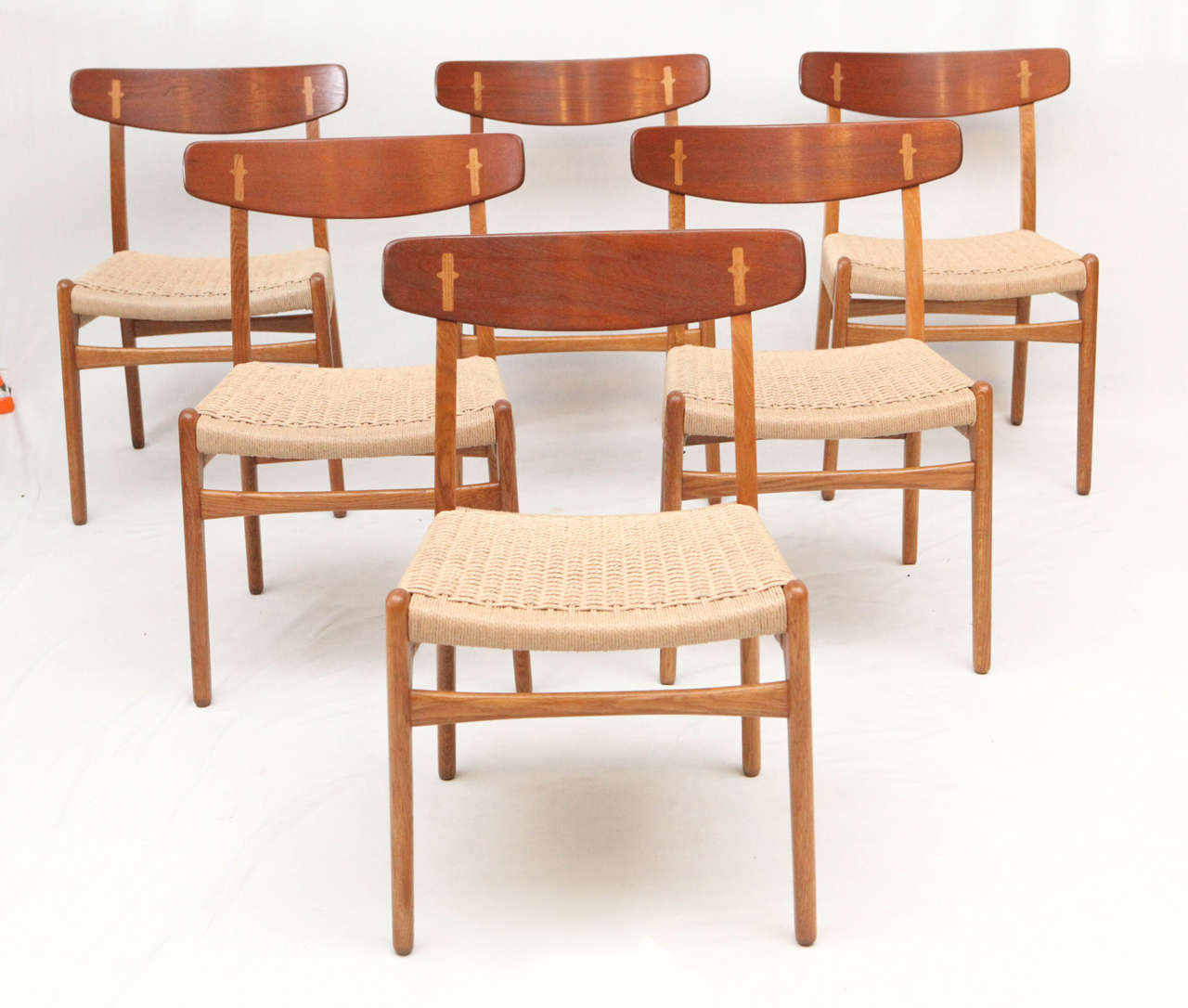 Set of six Hans Wegner CH 23 dining chairs designed in 1951 and produced by Carl Hansen & Son.