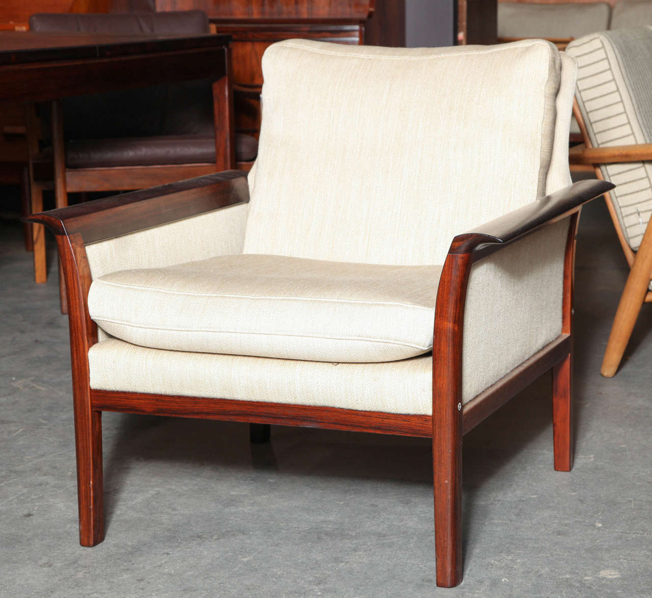 Vintage 1960s Norwegian Knut Lounge Chairs

These Vintage Club Chairs are very comfortable. The rosewood and structure are in excellent. The fabric could probably use a good cleaning but once that is done you will have a pair of extremely