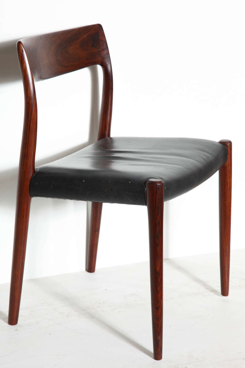 Vintage 1960s Neils Moller No. 77 Rosewood Dining Chairs

This Set of 8 Dining Chairs are in like-new condition with a leather seat. The leather is also in beautiful condition, can also be paper-corded or reupholstered to fit your style.