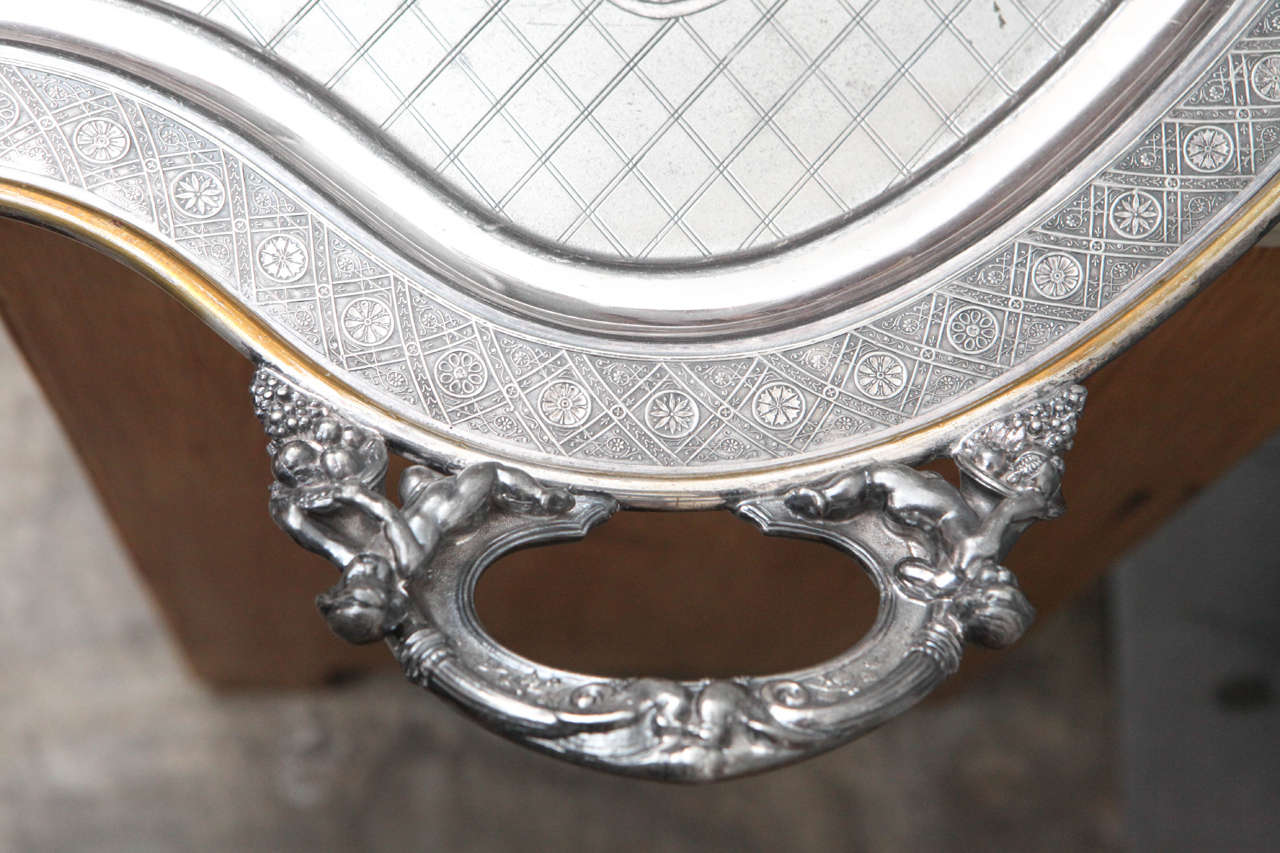 Silver Plated Butler Tray with Articulated Cherub Handles In Good Condition For Sale In Culver City, CA