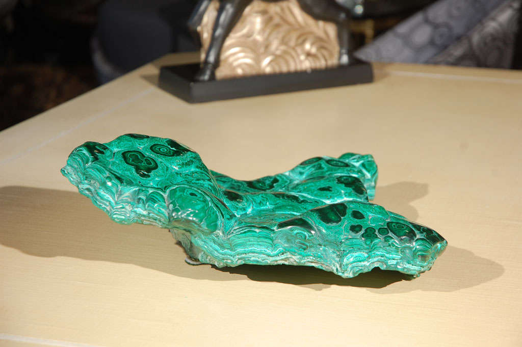 A beautiful natural slab specimen of malachite. Top has been polished to show off its natural beauty.