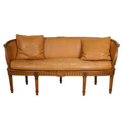 Louis XV-style leather upholstered settee